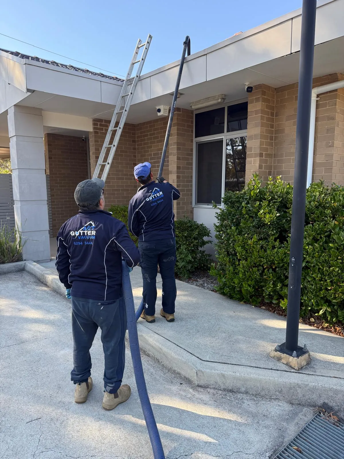 Residential roof gutter after debris has been cleared